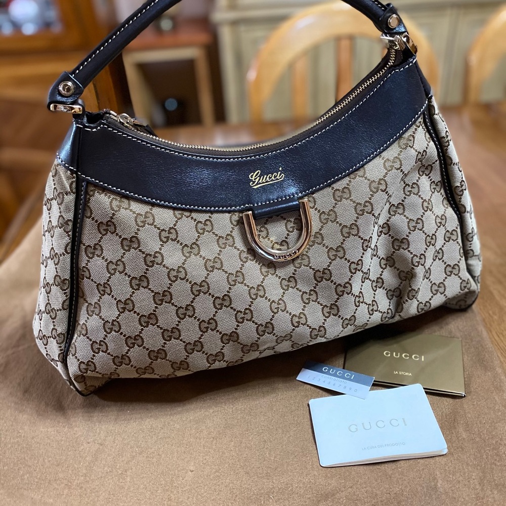 Gucci GG Canvas D-Gold Hobo with gold hardware top handle, zip top Hobo Bag